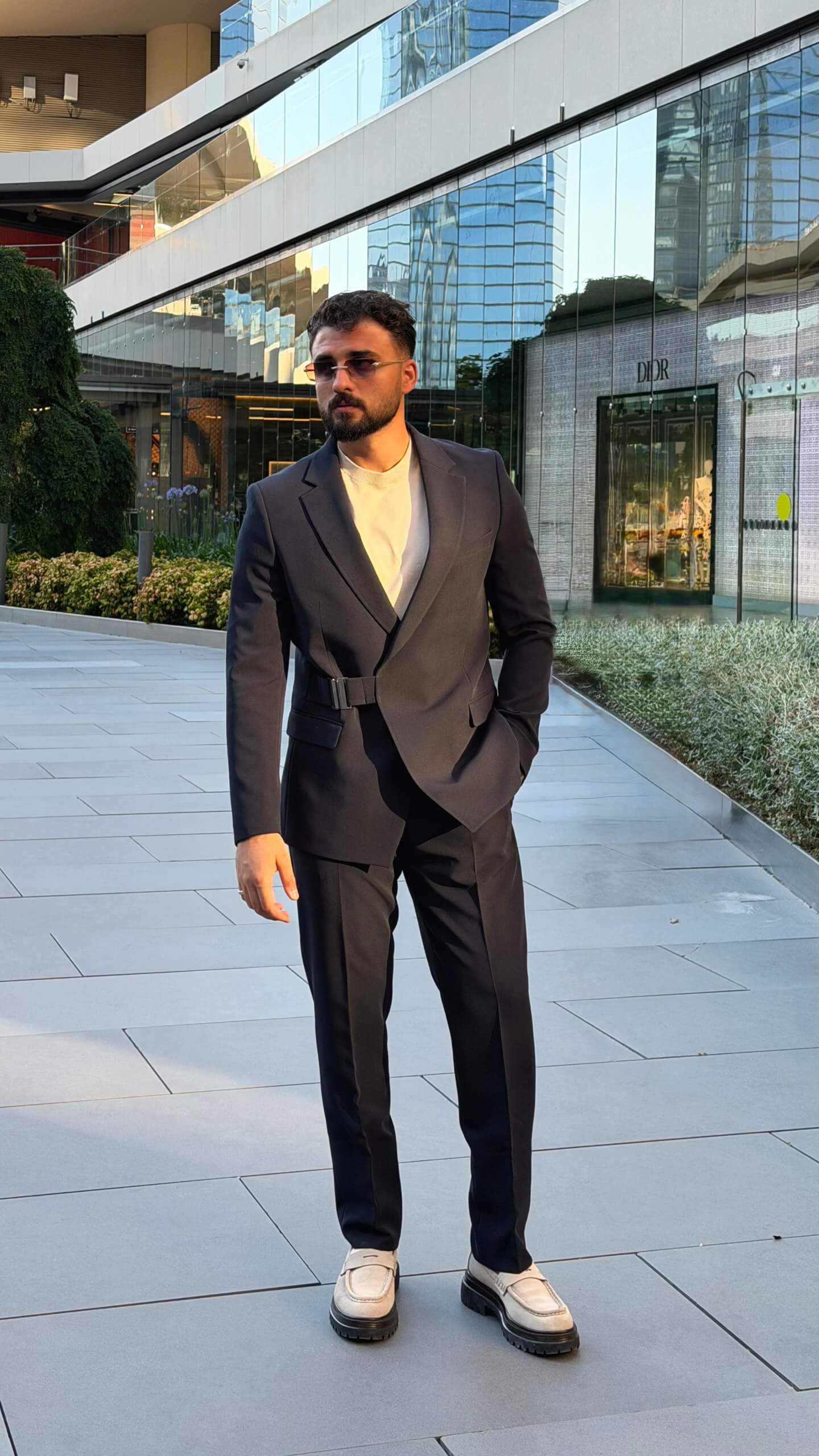 Men's navy blue single breasted suit with tailored jacket and trousers