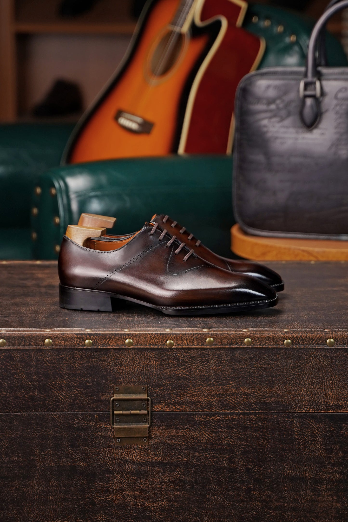 Men’s dark brown leather cap toe Oxford dress shoes featuring a polished finish, lace-up closure, sleek tapered toe, and classic formal silhouette.