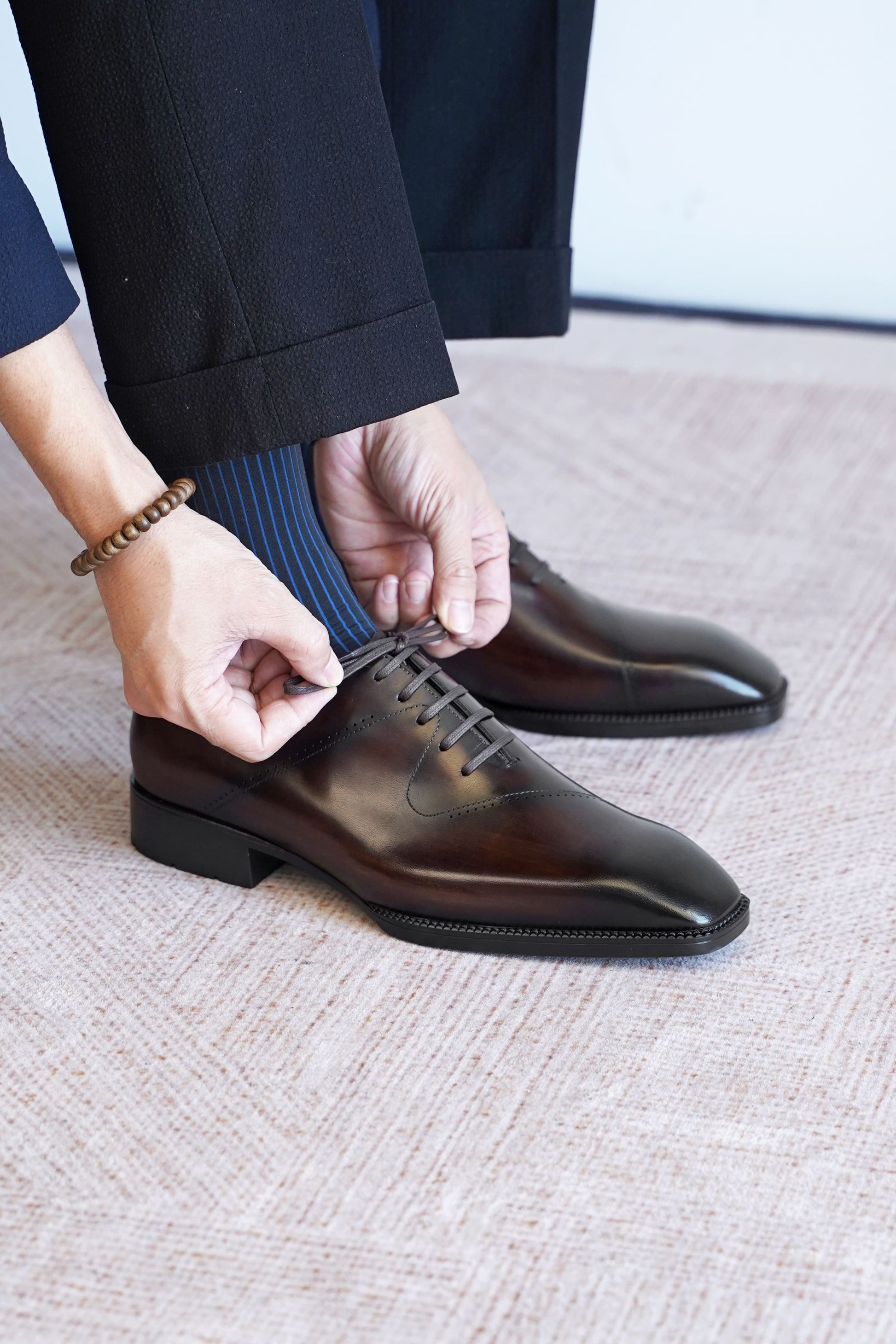Men’s dark brown leather cap toe Oxford dress shoes featuring a polished finish, lace-up closure, sleek tapered toe, and classic formal silhouette.