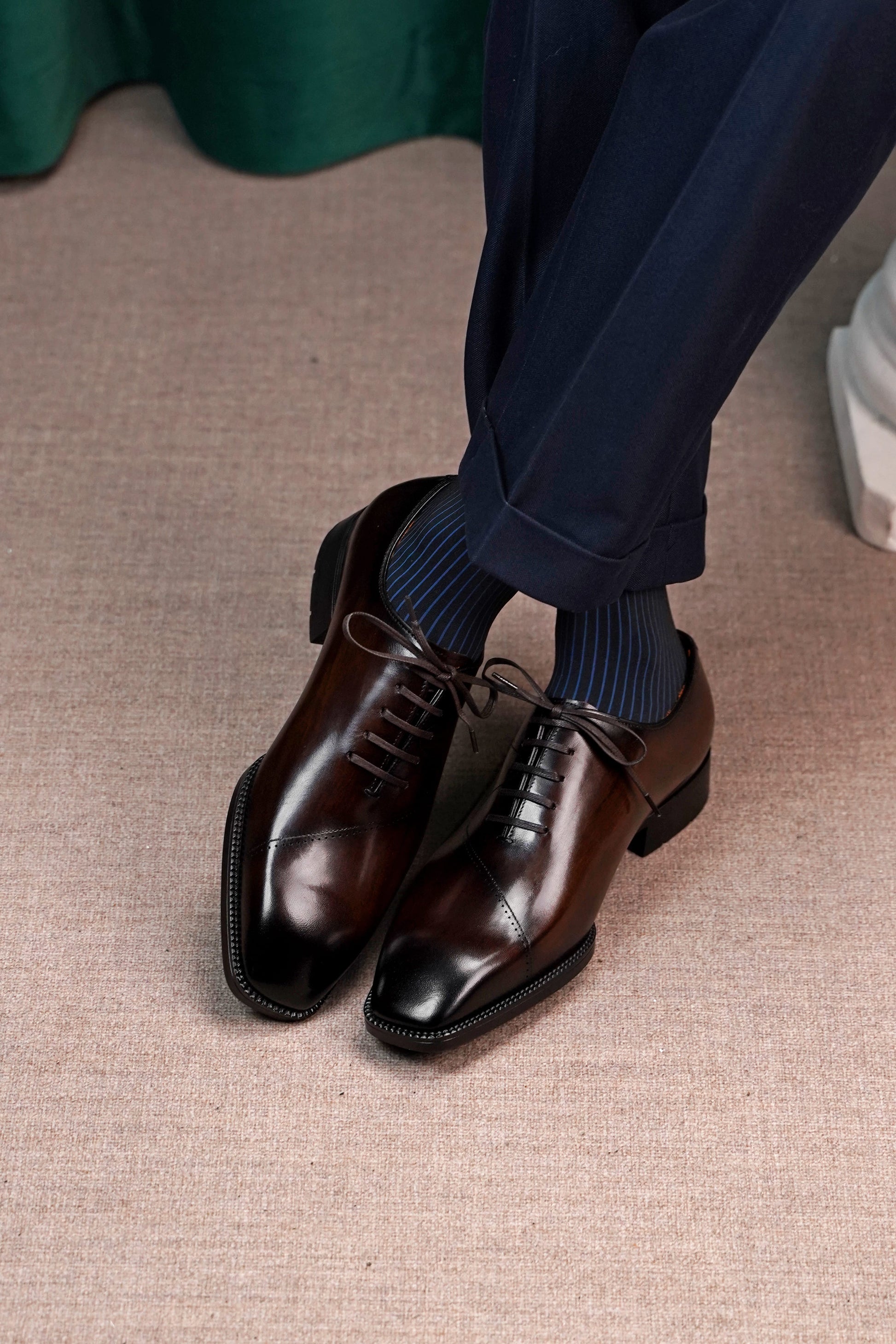 Men’s dark brown leather cap toe Oxford dress shoes featuring a polished finish, lace-up closure, sleek tapered toe, and classic formal silhouette.