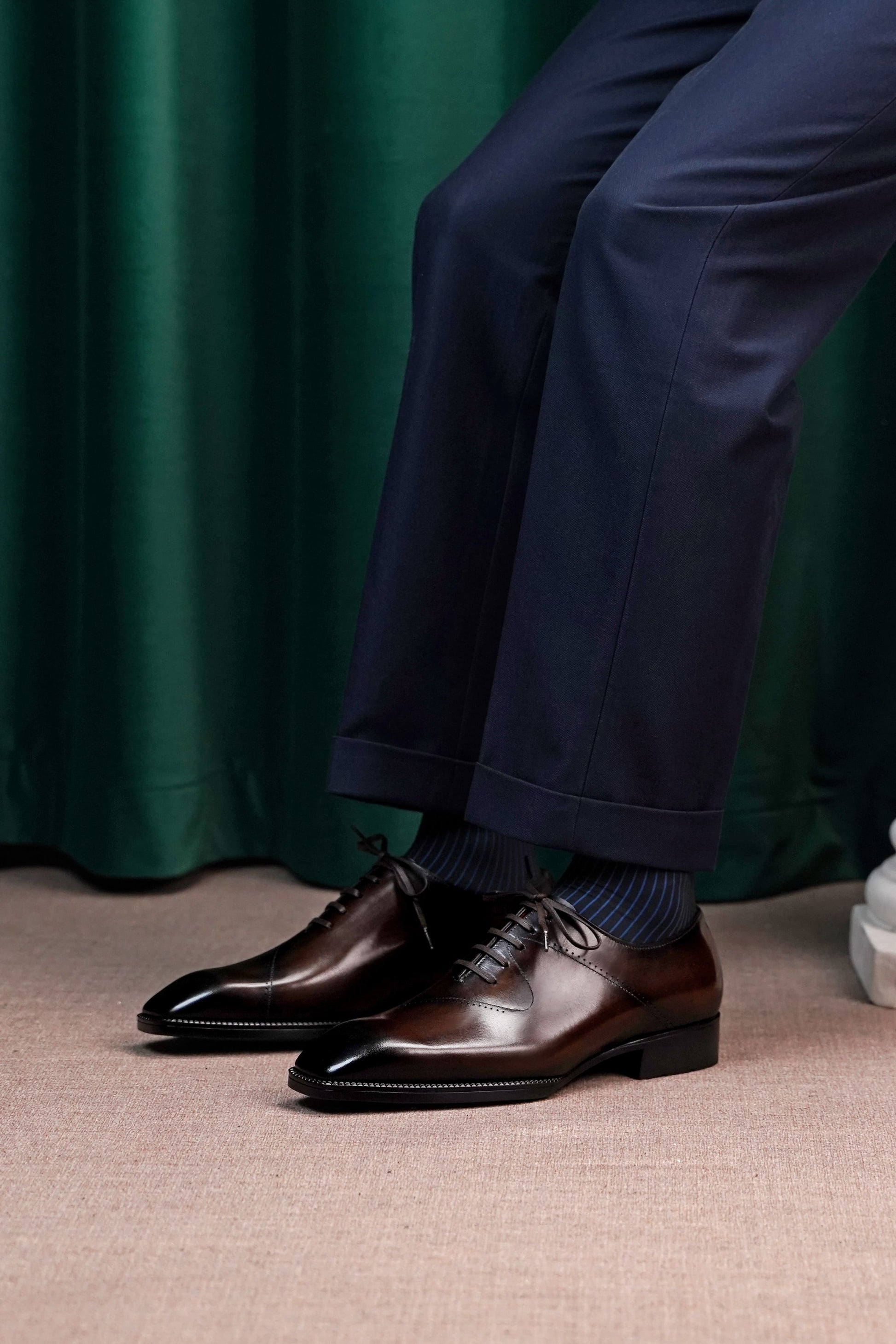 Men’s dark brown leather cap toe Oxford dress shoes featuring a polished finish, lace-up closure, sleek tapered toe, and classic formal silhouette.
