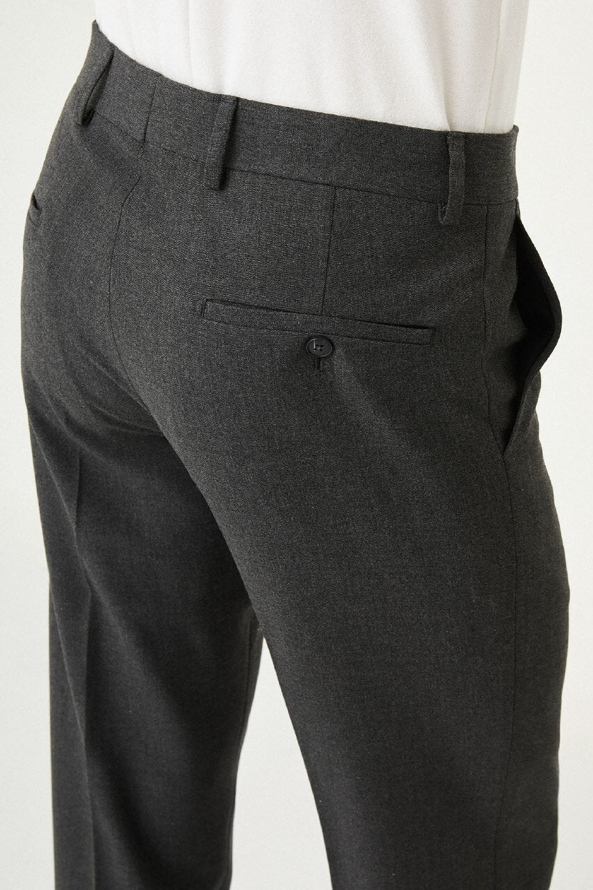 Dark Gray slim-fit formal trousers with front pleats, styled with black leather shoes, ideal for office and semi-formal summer events.