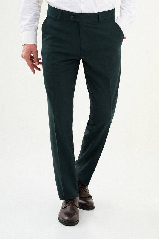 Men wearing dark grey slim-fit classic trousers, styled with formal shoes, suitable for office or business occasions.