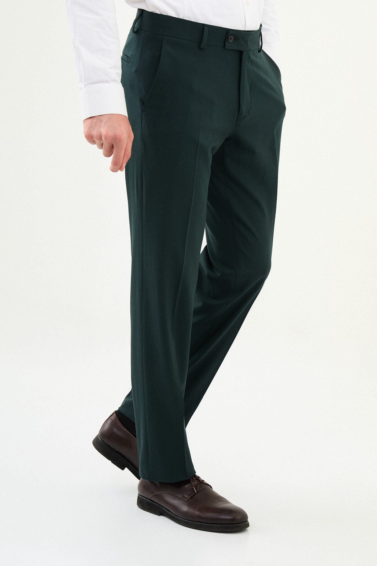 Men wearing dark grey slim-fit classic trousers, styled with formal shoes, suitable for office or business occasions.