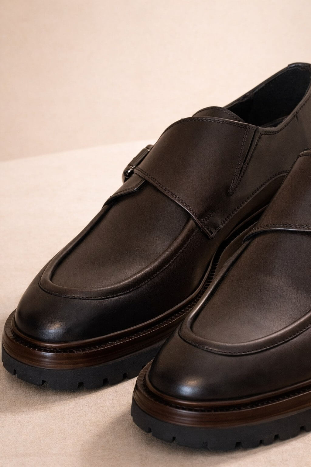 Dark brown leather monk strap shoes with chunky EVA sole