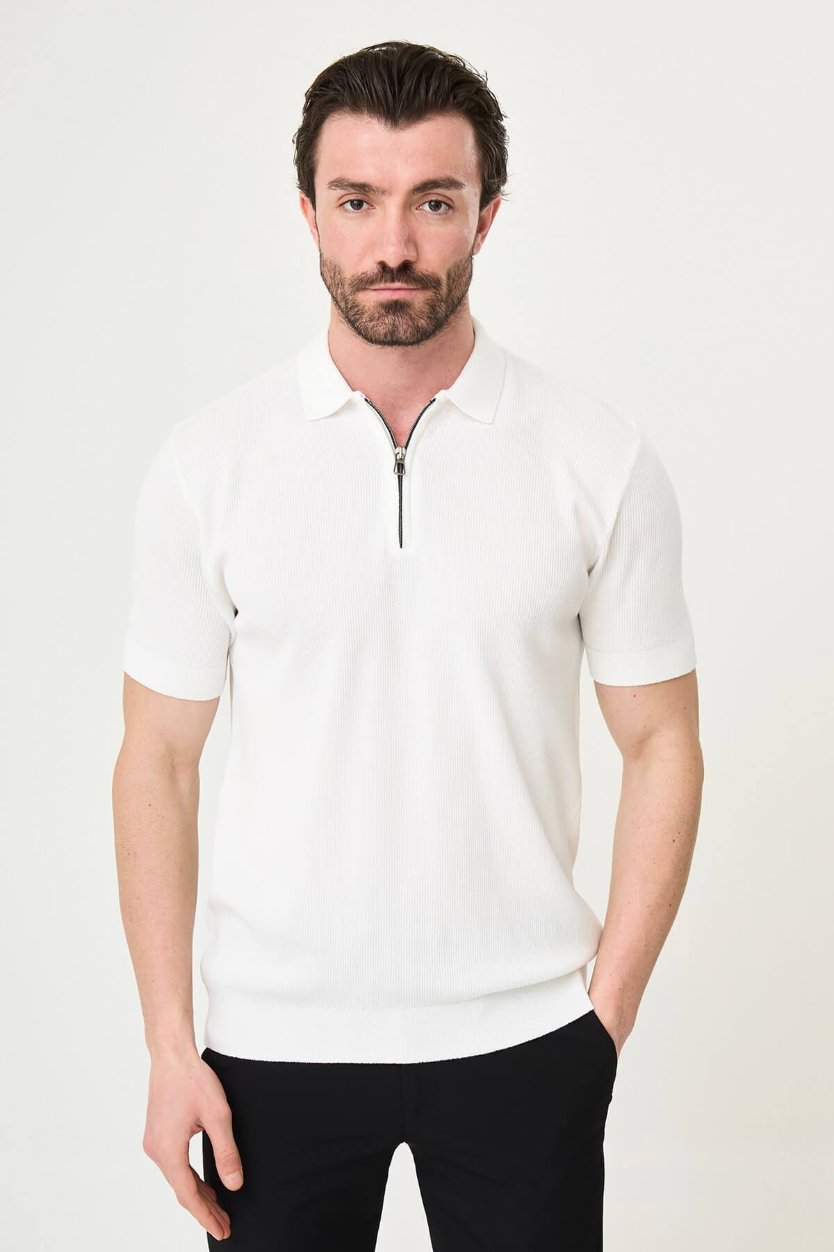 Men’s ecru slim-fit quarter-zip knit polo shirt with ribbed texture, short sleeves, classic collar, and modern luxury casual design.