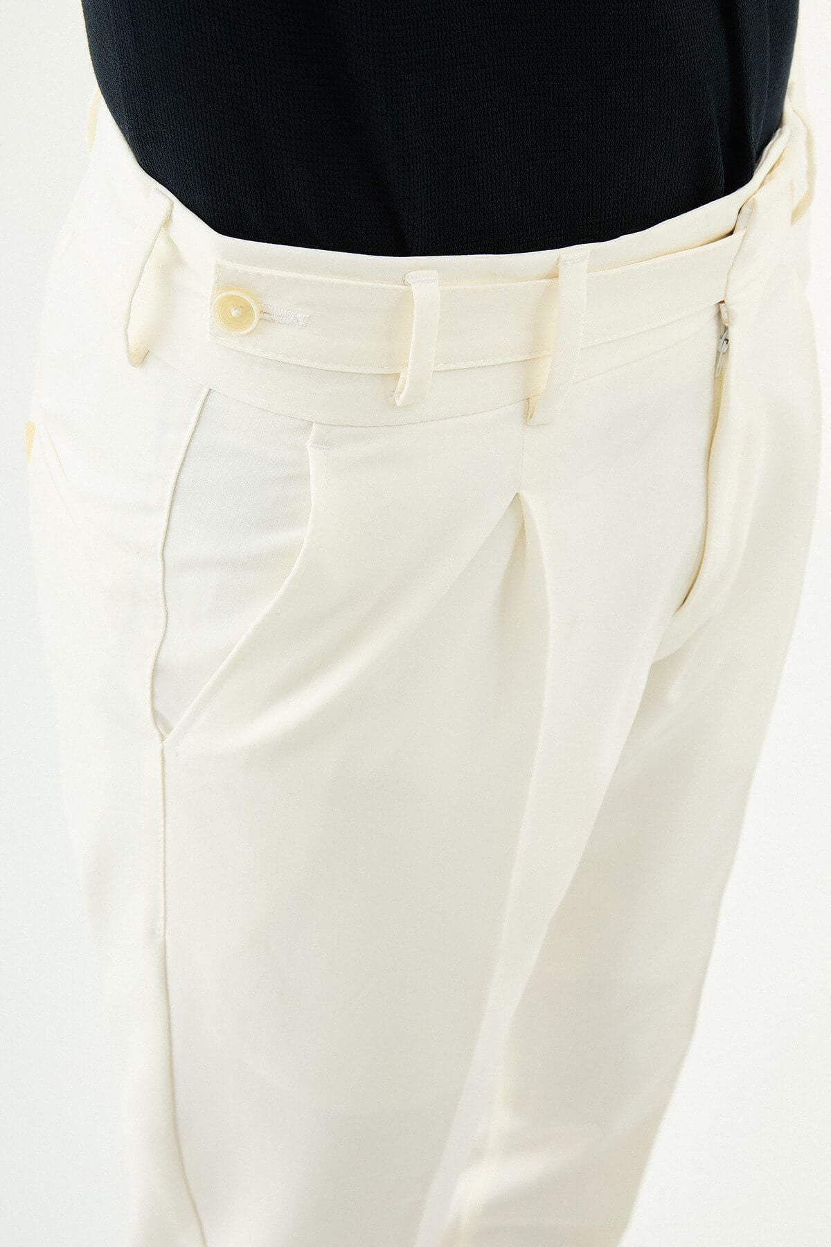 Ecru slim-fit straight-leg pleated trousers for men, styled with black leather shoes, perfect for summer formal and business wear.