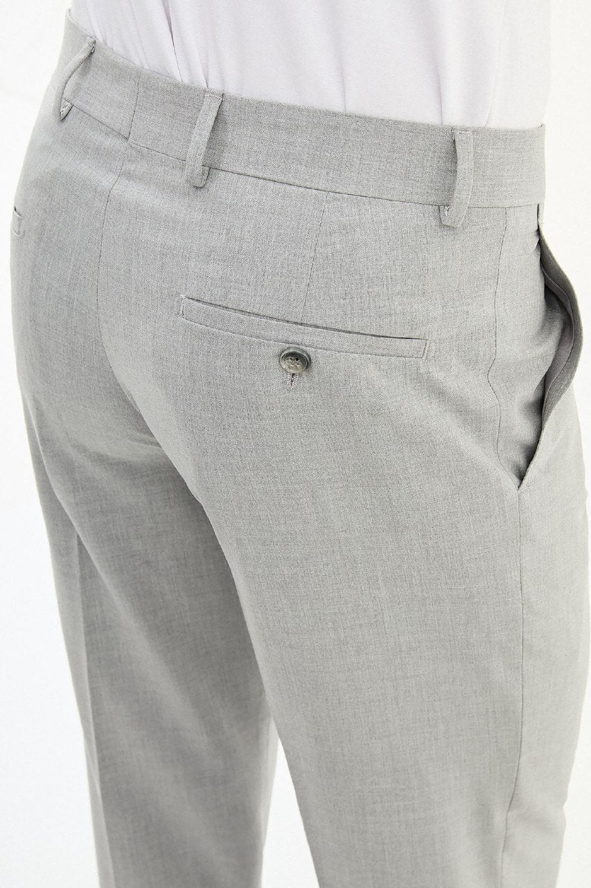 Men wearing gray slim-fit formal trousers with black dress shoes, styled for summer office and formal occasions.