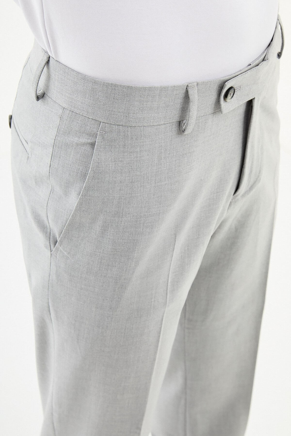 Men wearing gray slim-fit formal trousers with black dress shoes, styled for summer office and formal occasions.