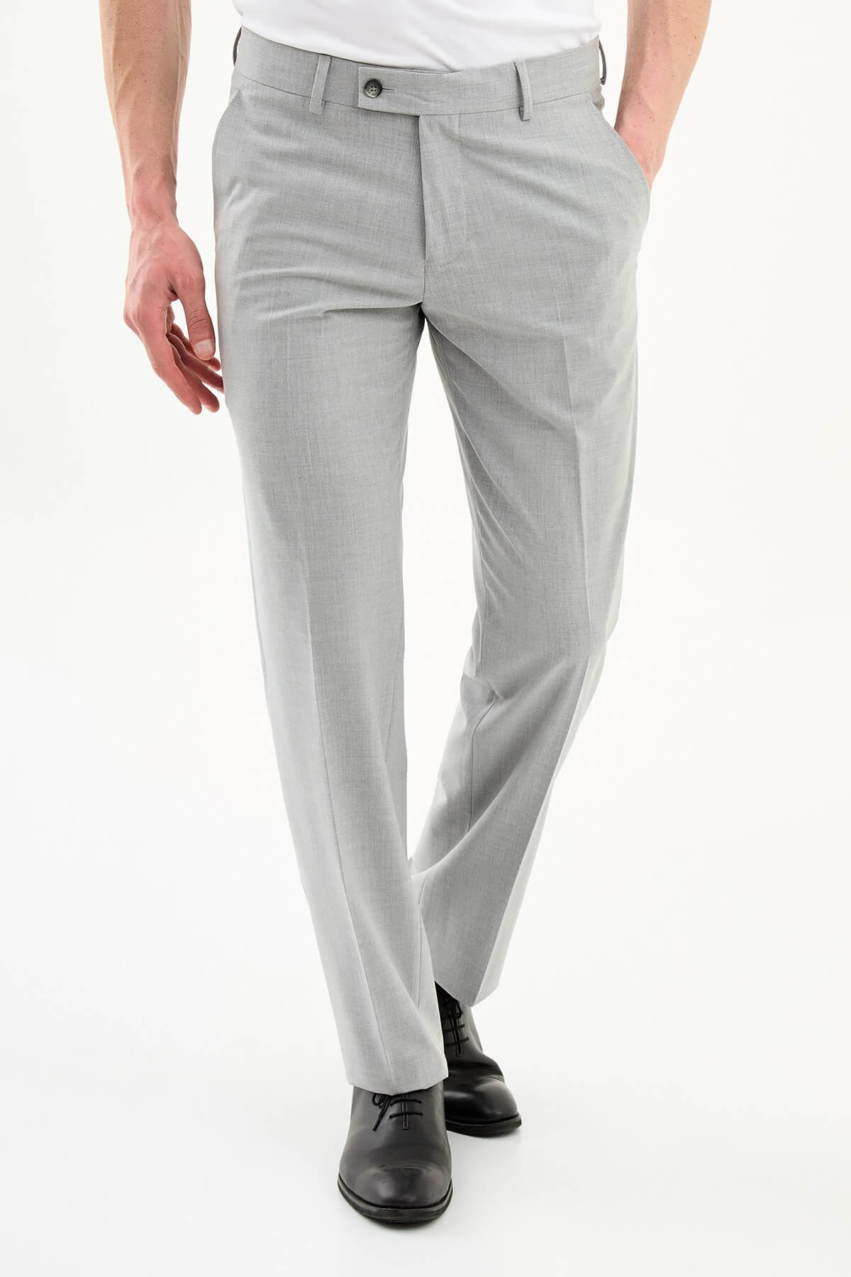 Men wearing gray slim-fit formal trousers with black dress shoes, styled for summer office and formal occasions.