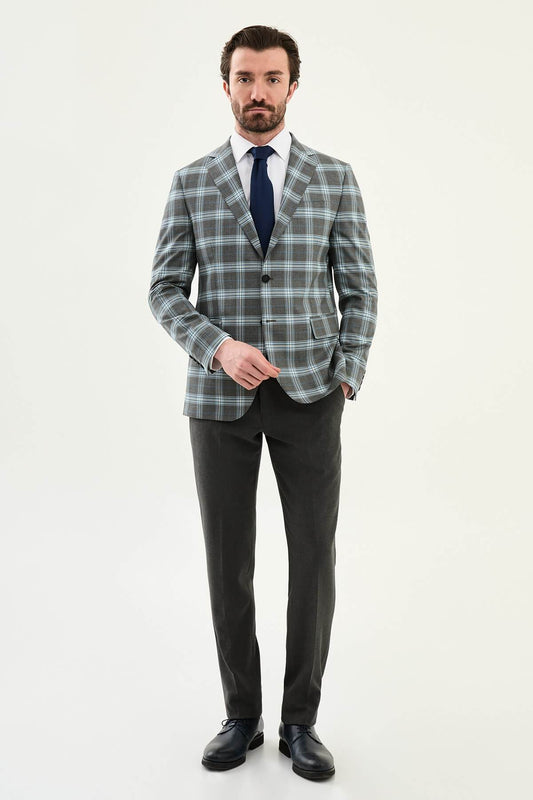 Men’s Gray Plaid Slim Fit Suit on model, paired with a navy tie.