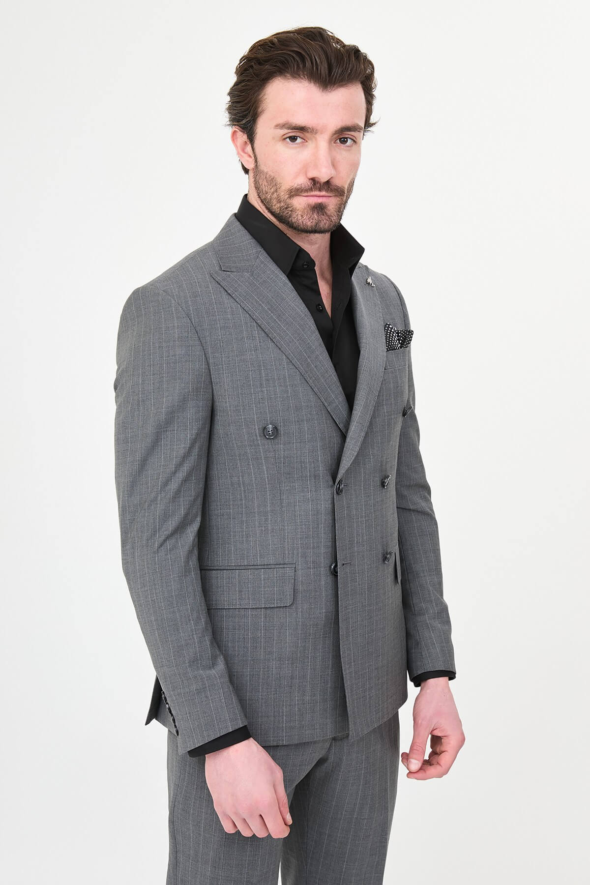 Men’s Gray Pinstripe Double-Breasted Suit, showing slim-fit trousers and black oxford shoes.
