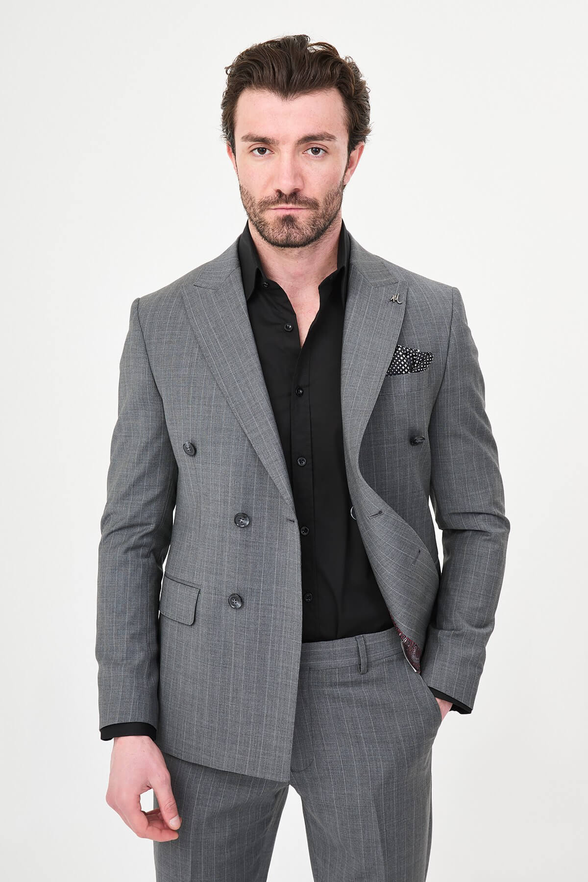 Men’s Gray Pinstripe Double-Breasted Suit, showing slim-fit trousers and black oxford shoes.