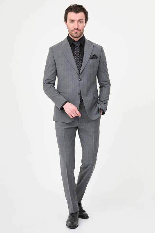 Man wearing Men’s Gray Slim-Fit Wide Collar Premium Wool Suit, styled with formal shoes and a dress shirt, ideal for summer weddings and business events.