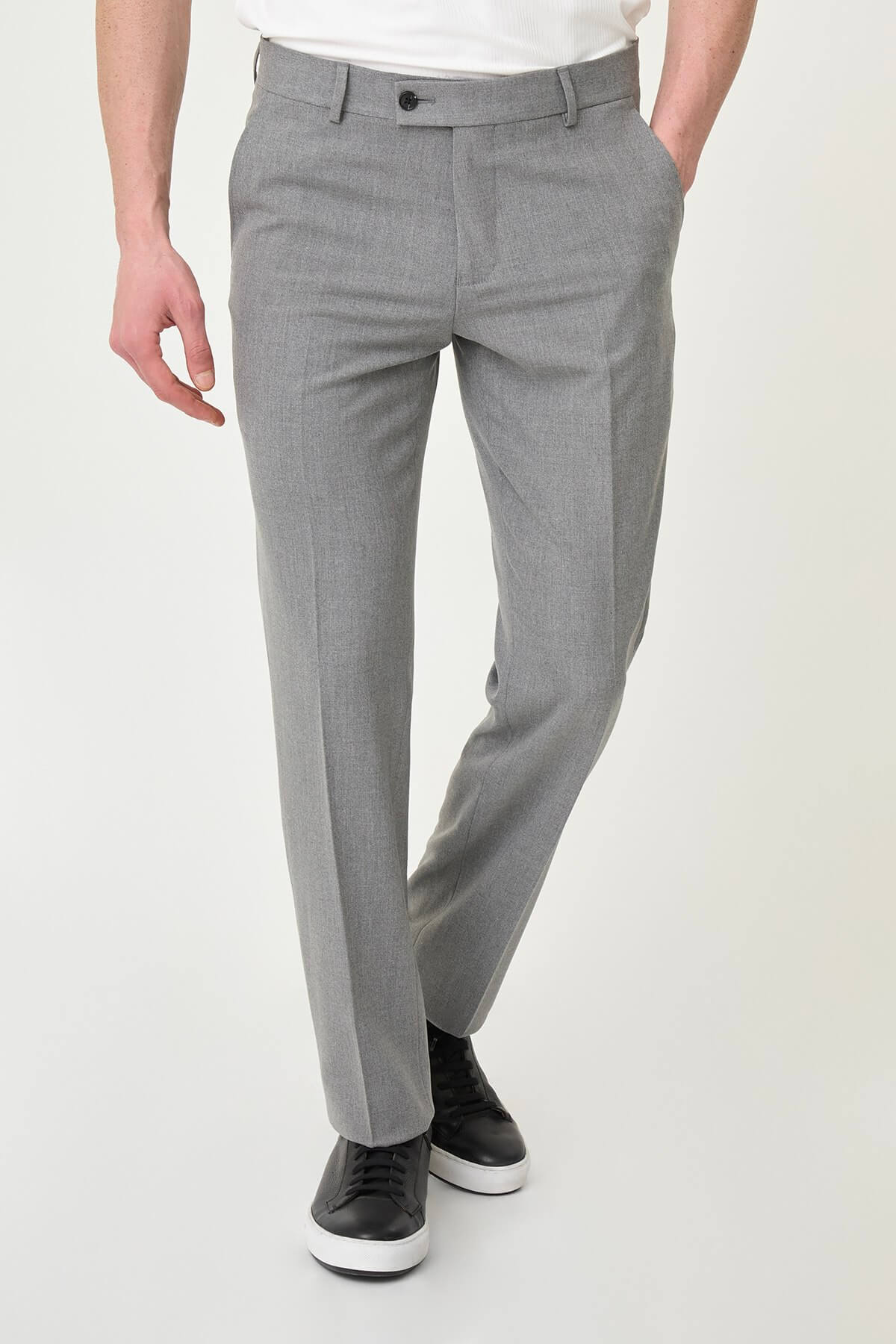 Gray slim-fit formal trousers with front pleats, styled with black or brown leather shoes, ideal for summer office and semi-formal occasions.