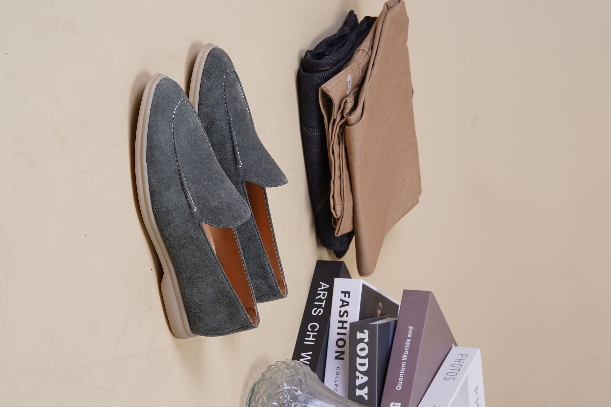Men’s grey suede leather casual slip-on loafers with moccasin stitching and lightweight sole.