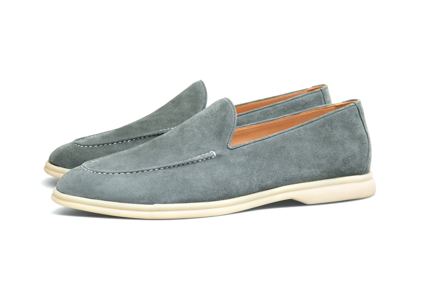 Men’s grey suede leather casual slip-on loafers with moccasin stitching and lightweight sole.
