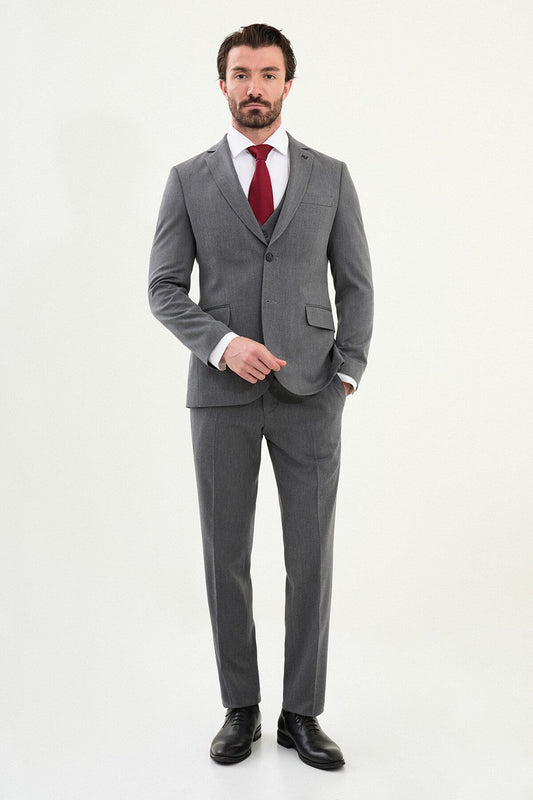 Men’s micro-heathered gray slim-fit three-piece winter suit with single-breasted 2-button jacket, 5-button waistcoat, notch lapels with AMF stitching, and black origami lapel pin.