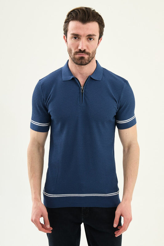 Male model wearing an indigo slim-fit quarter-zip polo T-shirt with short sleeves, styled for summer smart-casual outfits.
