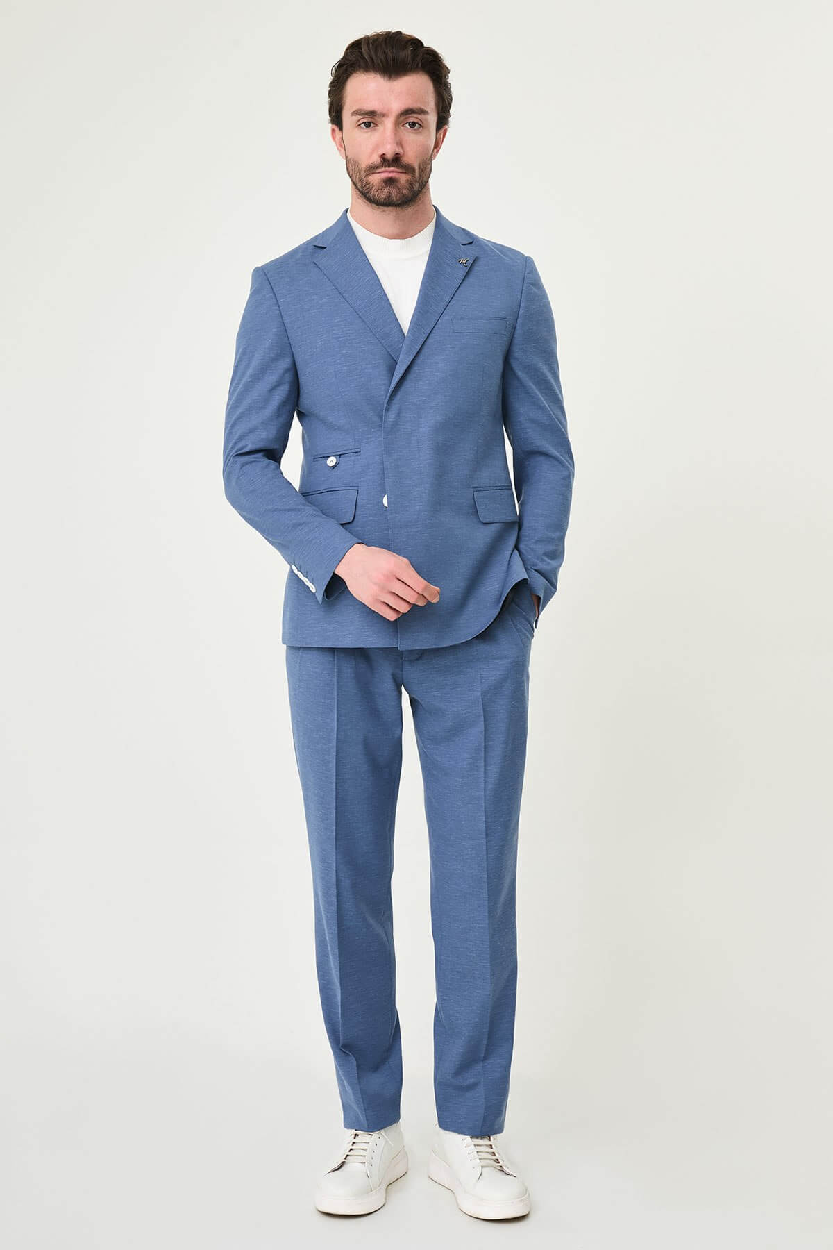 Indigo 2 piece slim fit suit with single breasted jacket and matching trousers, front view