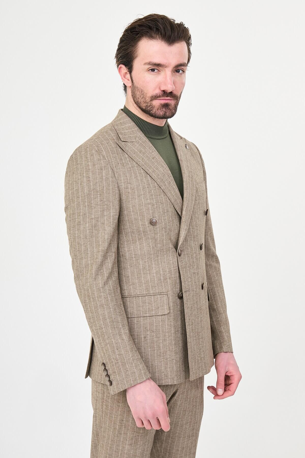 Men wearing a khaki pinstripe double-breasted slim-fit suit from the summer collection, styled with dress shoes and a green turtleneck