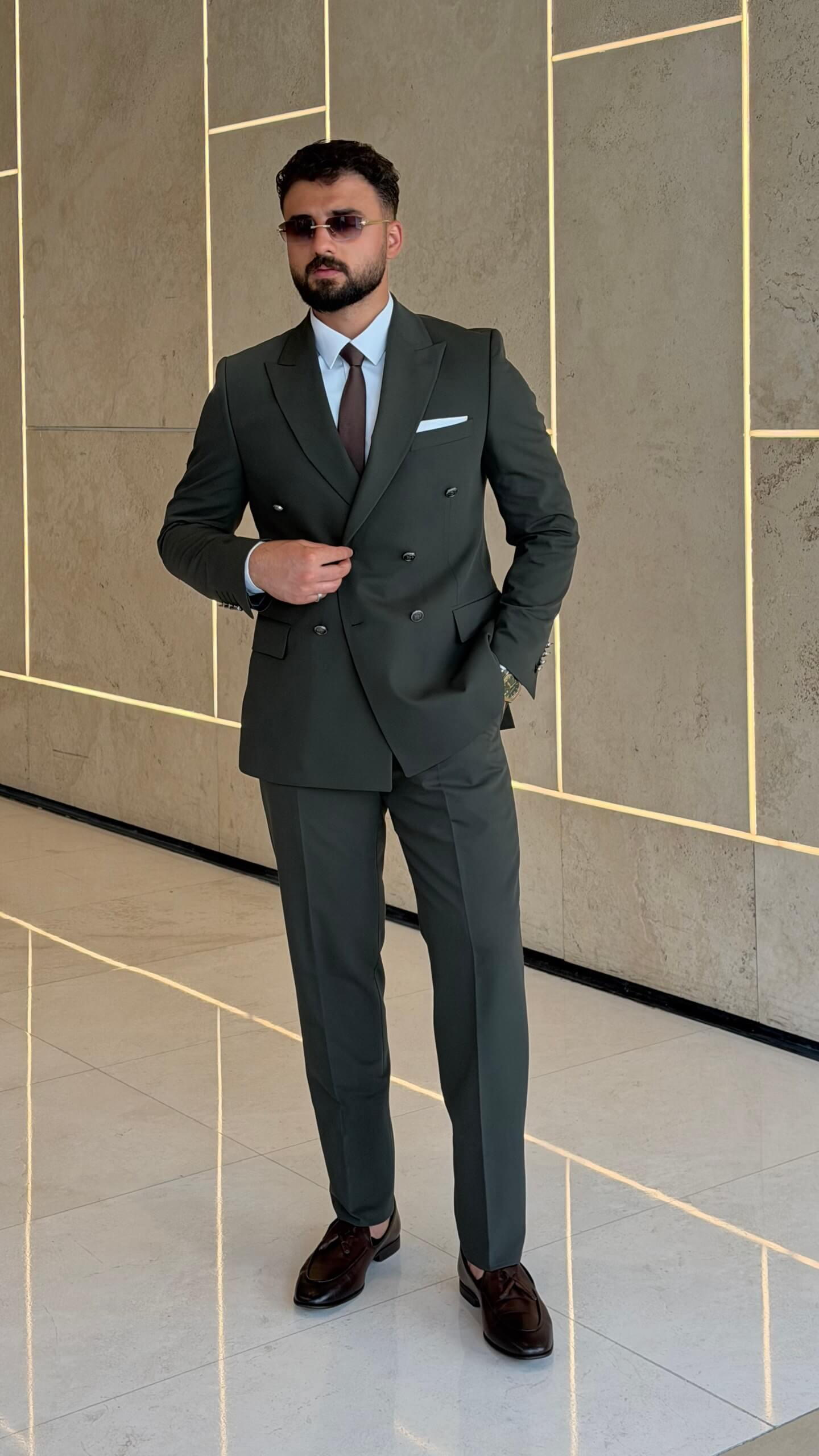 Men's khaki double breasted suit with tailored jacket and matching trousers