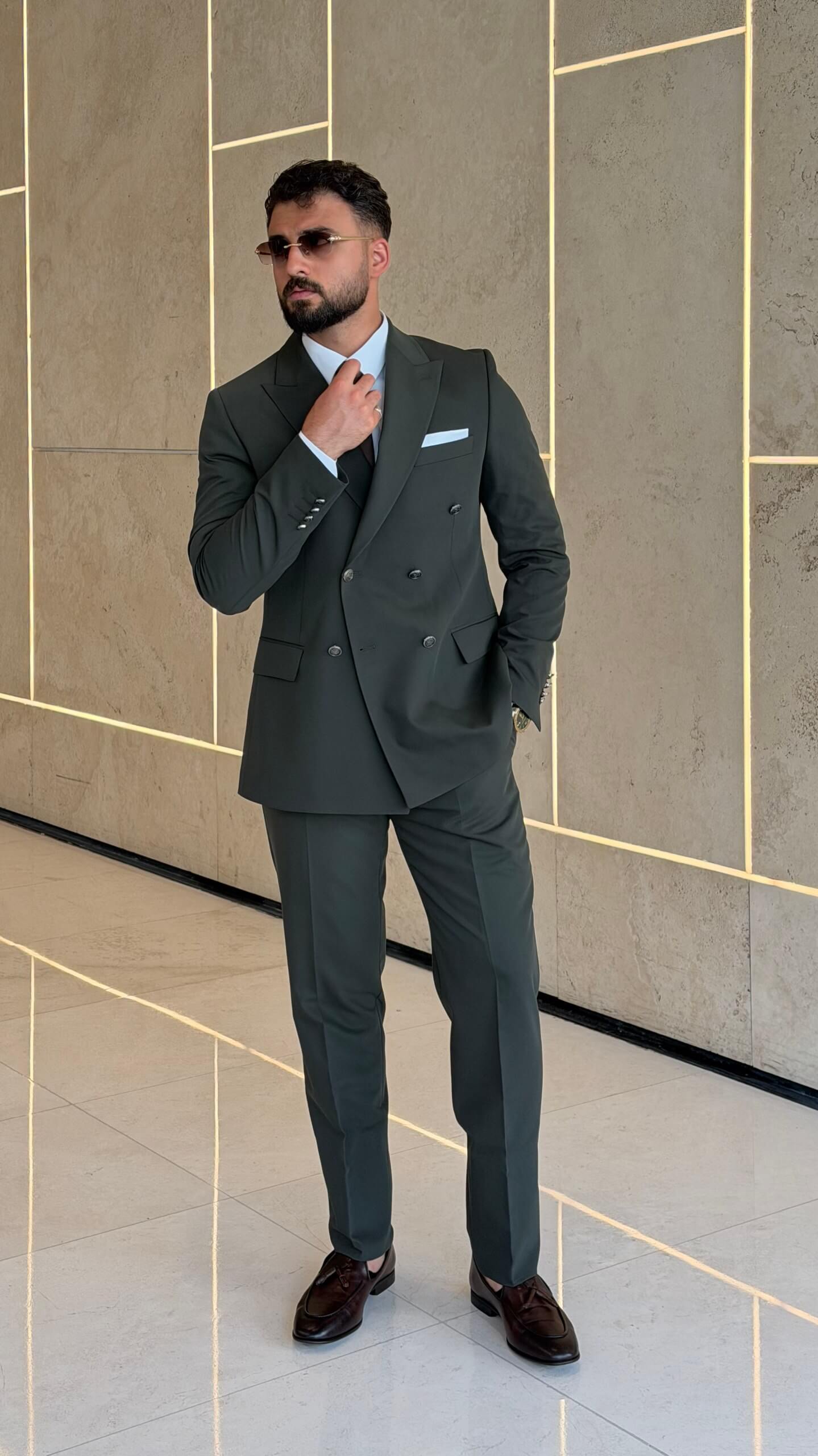 Men's khaki double breasted suit with tailored jacket and matching trousers