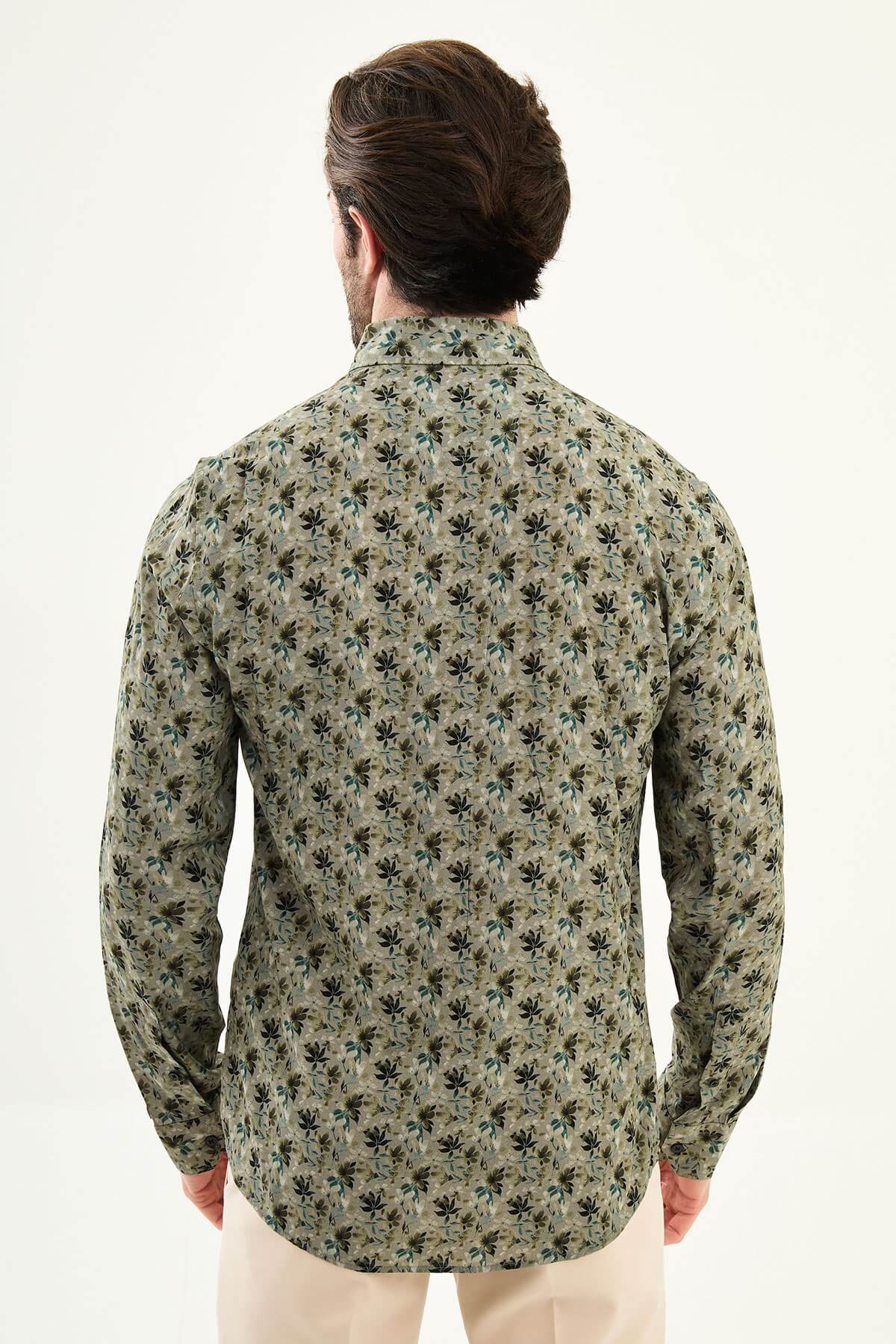 Khaki long-sleeve men’s shirt with floral pattern, slim fit, modeled front view, summer collection.