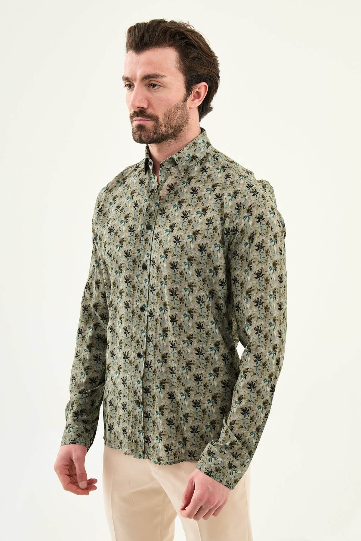 Khaki long-sleeve men’s shirt with floral pattern, slim fit, modeled front view, summer collection.