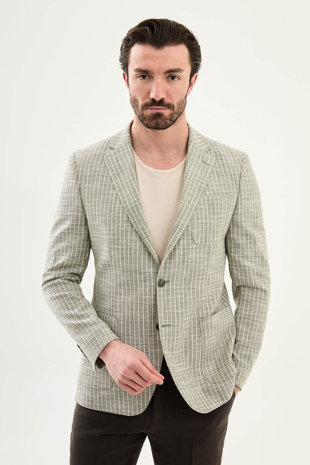 Men’s khaki slim fit cotton linen blazer with a lightweight textured finish, styled for smart casual and formal summer occasions.