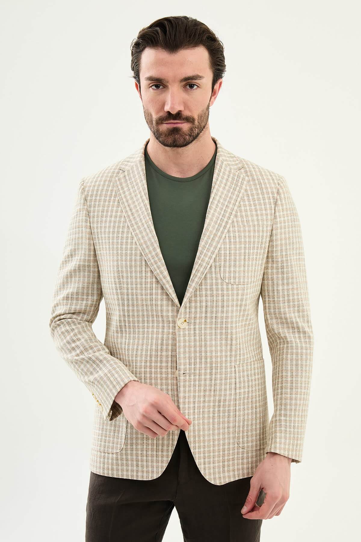 Men’s khaki slim fit cotton linen blazer with a lightweight textured pattern, styled for smart casual and elegant summer occasions.