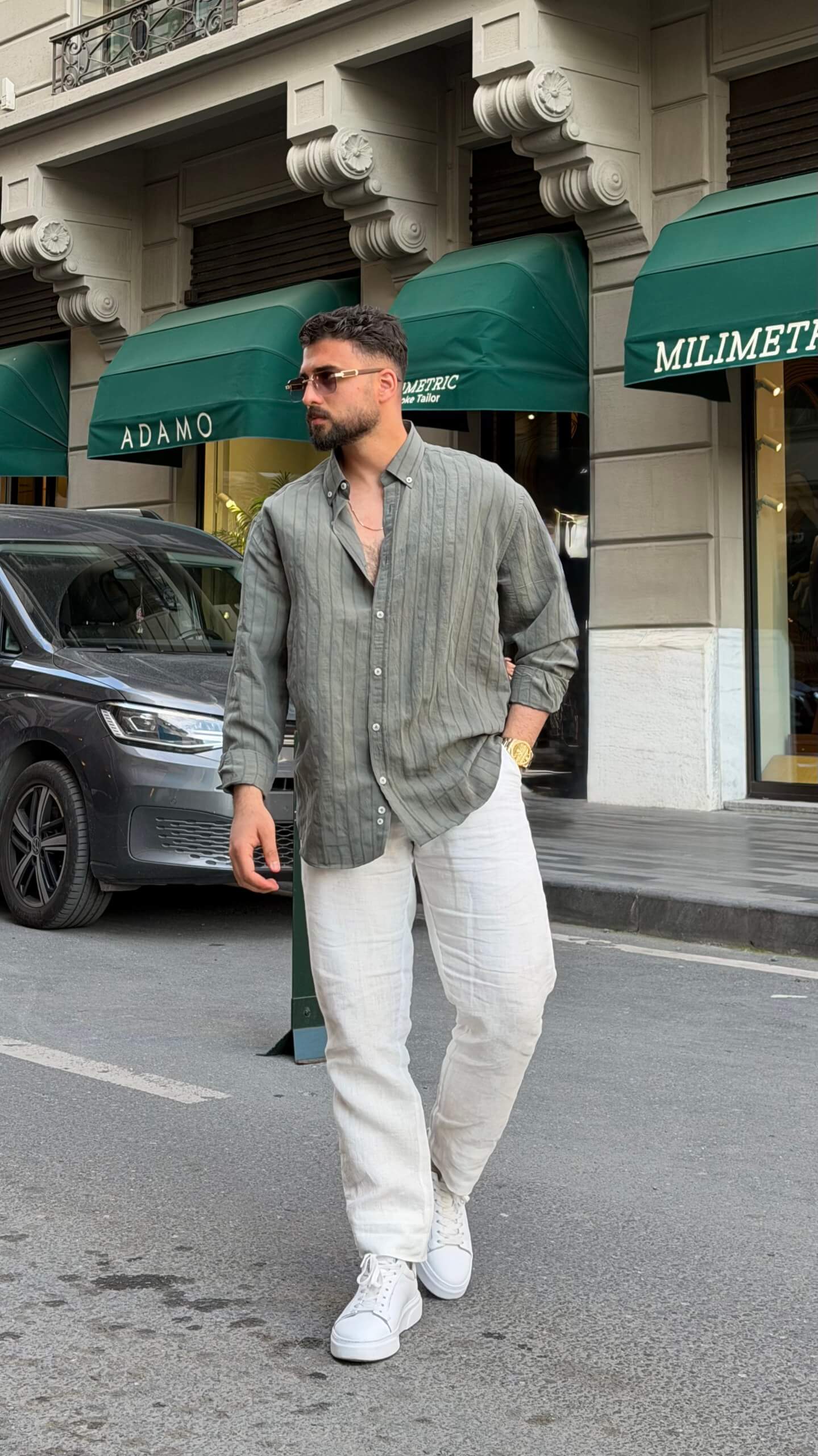 Men's khaki vertical-striped shirt with button front, full-length view