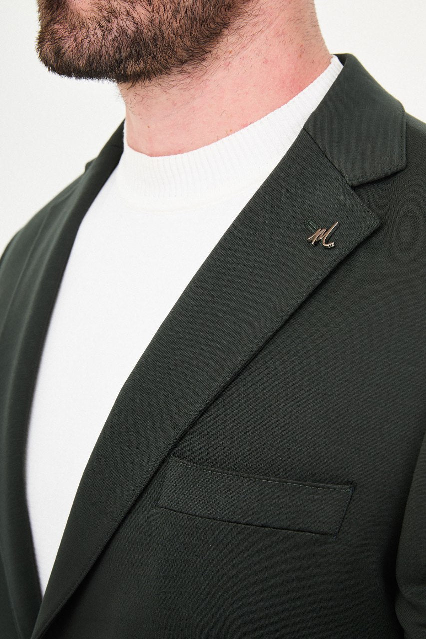 Men's khaki green slim-fit casual suit featuring a two-button blazer, notch lapels and matching trousers