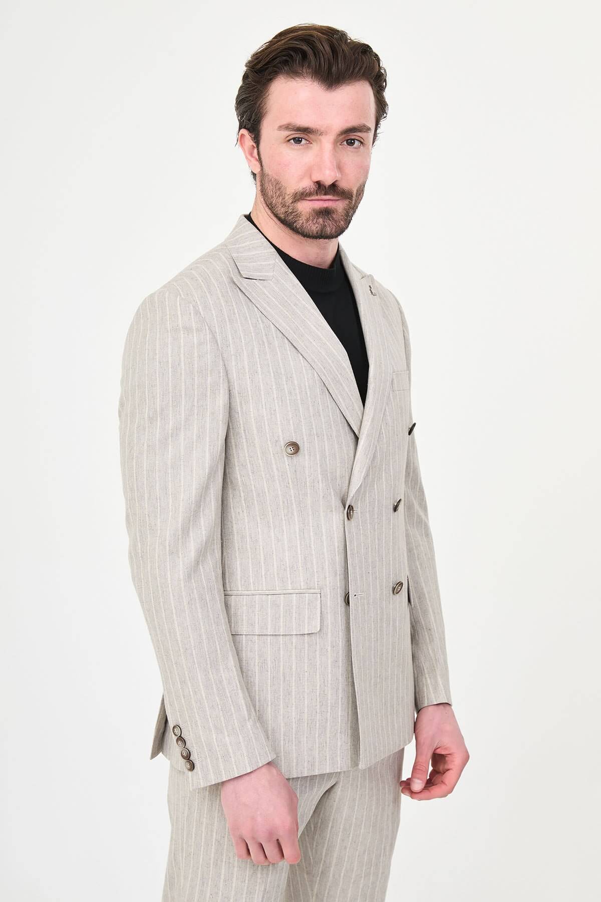 Light Beige Pinstripe Double-Breasted Suit worn by male model, slim fit, summer formalwear, front view, styled with black turtleneck and dress shoes.