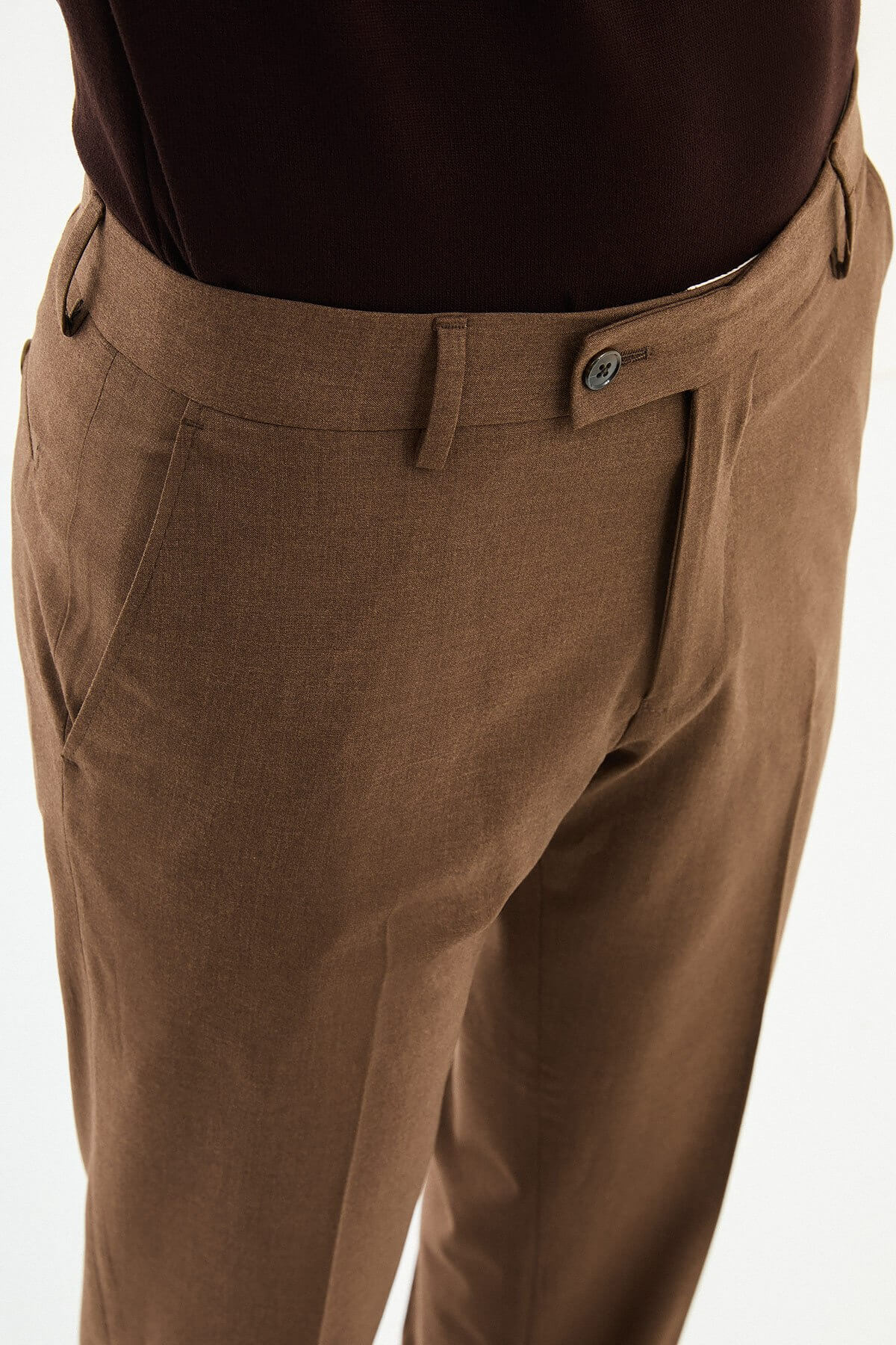 Men wearing light brown slim-fit formal trousers paired with brown dress shoes, styled for office and formal summer events.
