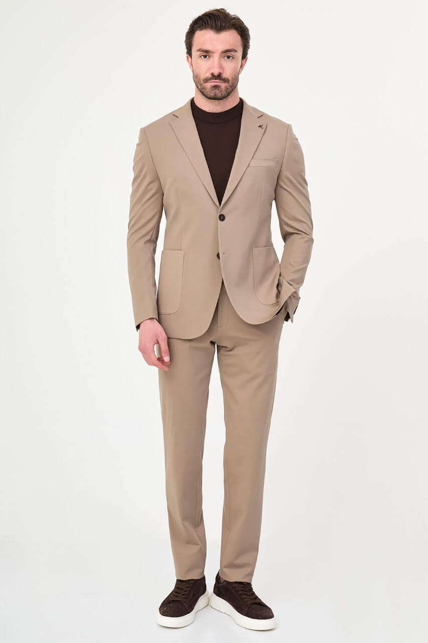 Men's mink slim-fit casual suit featuring a tailored blazer with notch lapels and matching trousers.