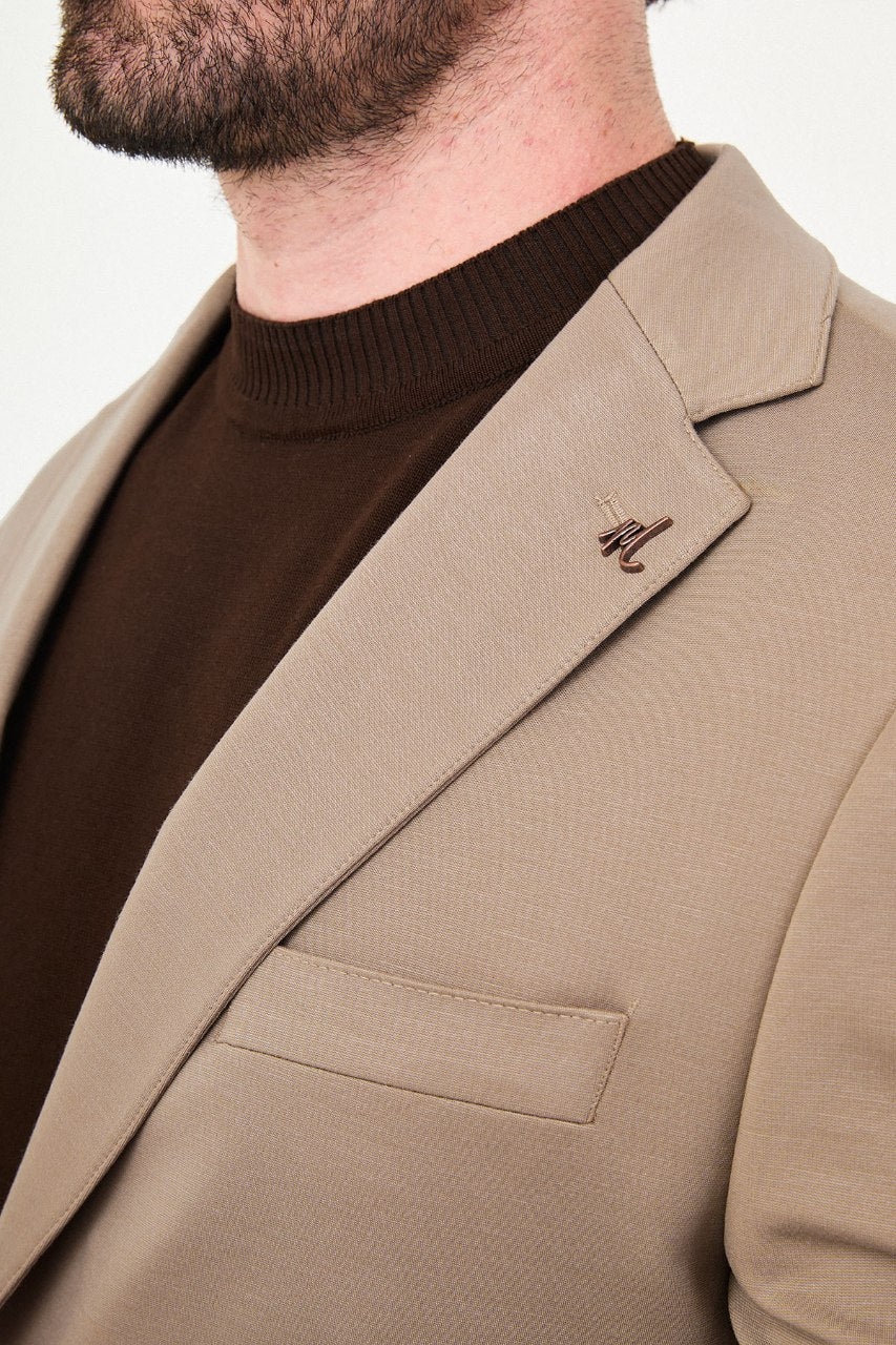 Men's mink slim-fit casual suit featuring a tailored blazer with notch lapels and matching trousers.