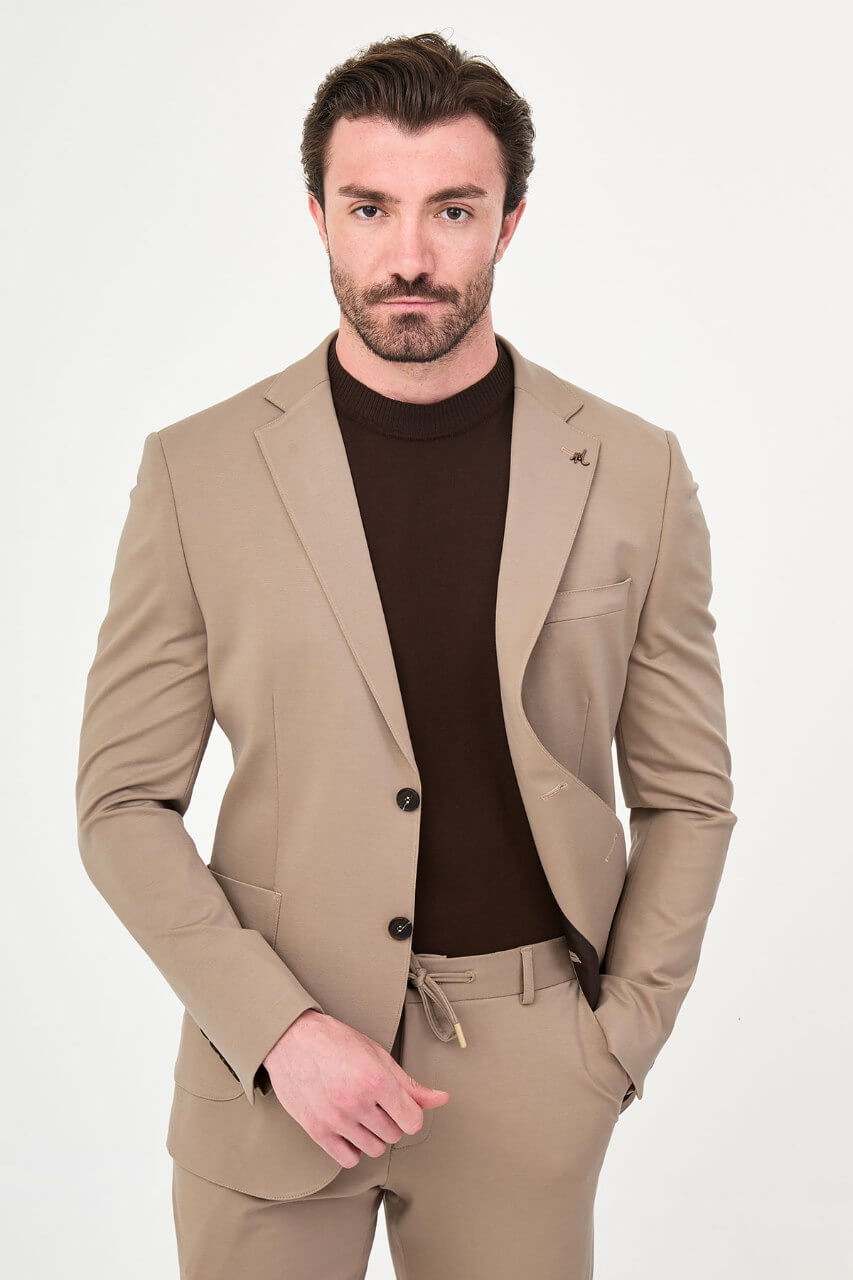 Men's mink slim-fit casual suit featuring a tailored blazer with notch lapels and matching trousers.