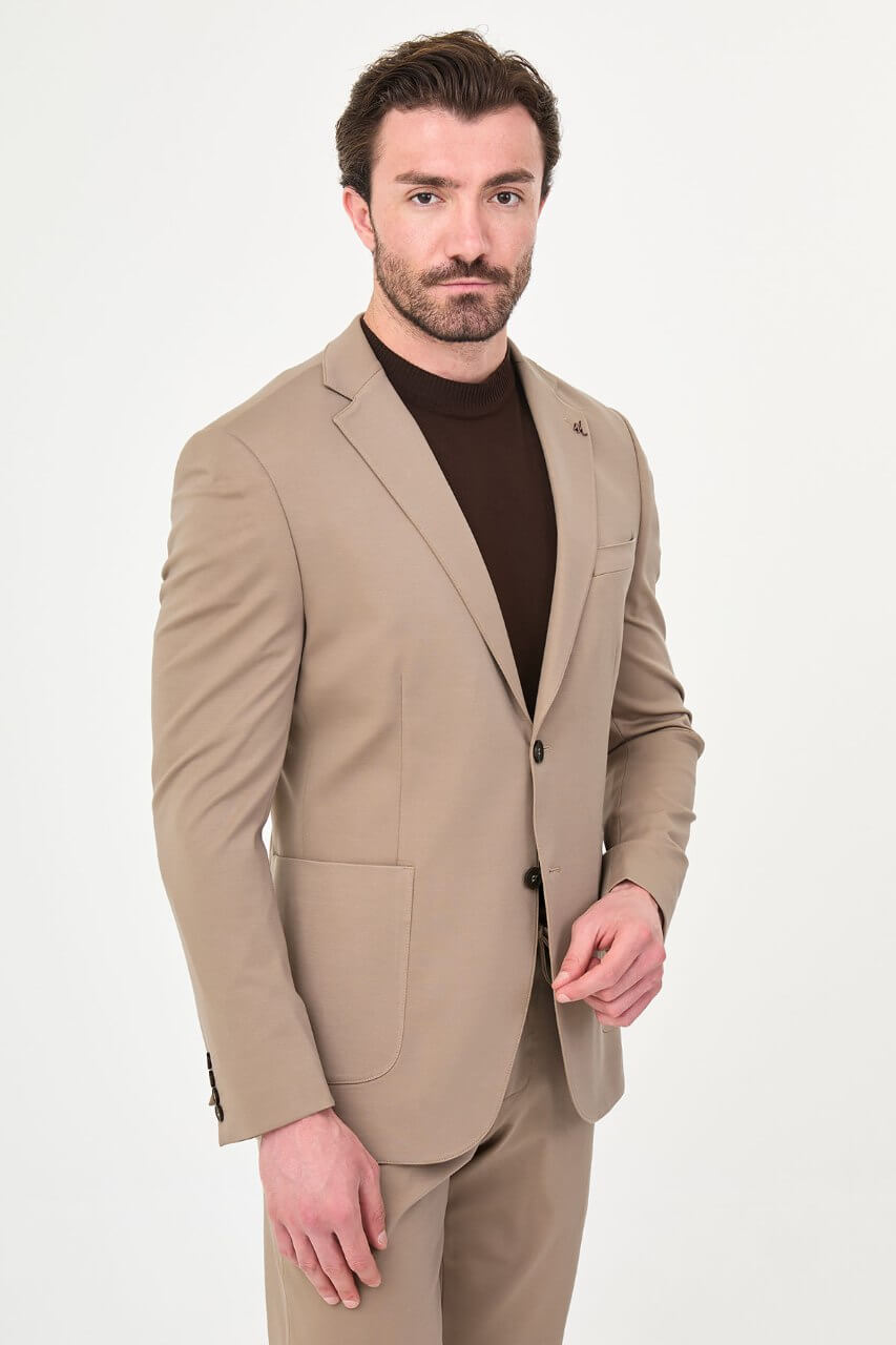 Men's mink slim-fit casual suit featuring a tailored blazer with notch lapels and matching trousers.