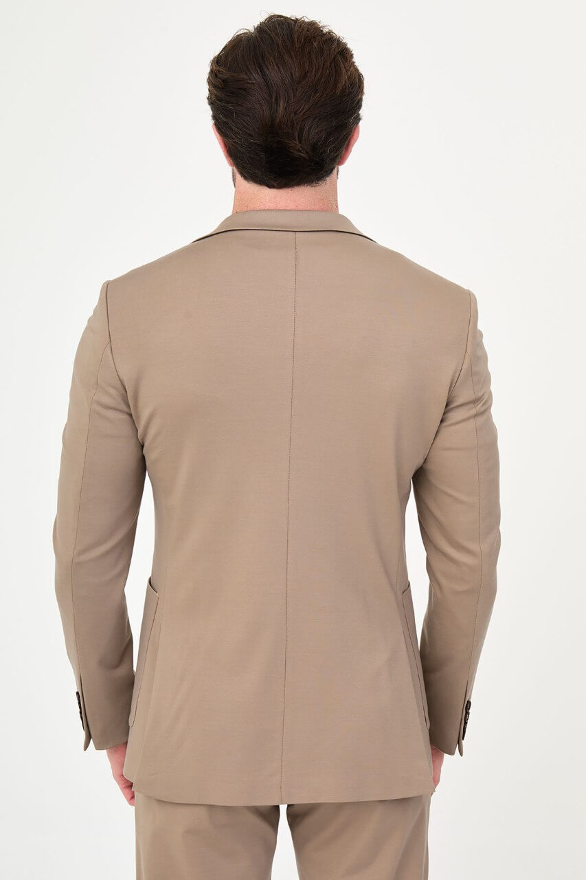 Men's mink slim-fit casual suit featuring a tailored blazer with notch lapels and matching trousers.