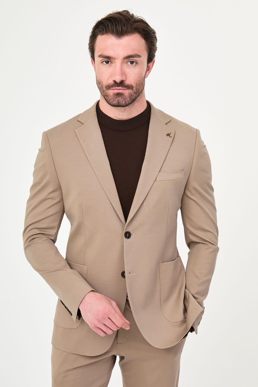 Men's mink slim-fit casual suit featuring a tailored blazer with notch lapels and matching trousers.