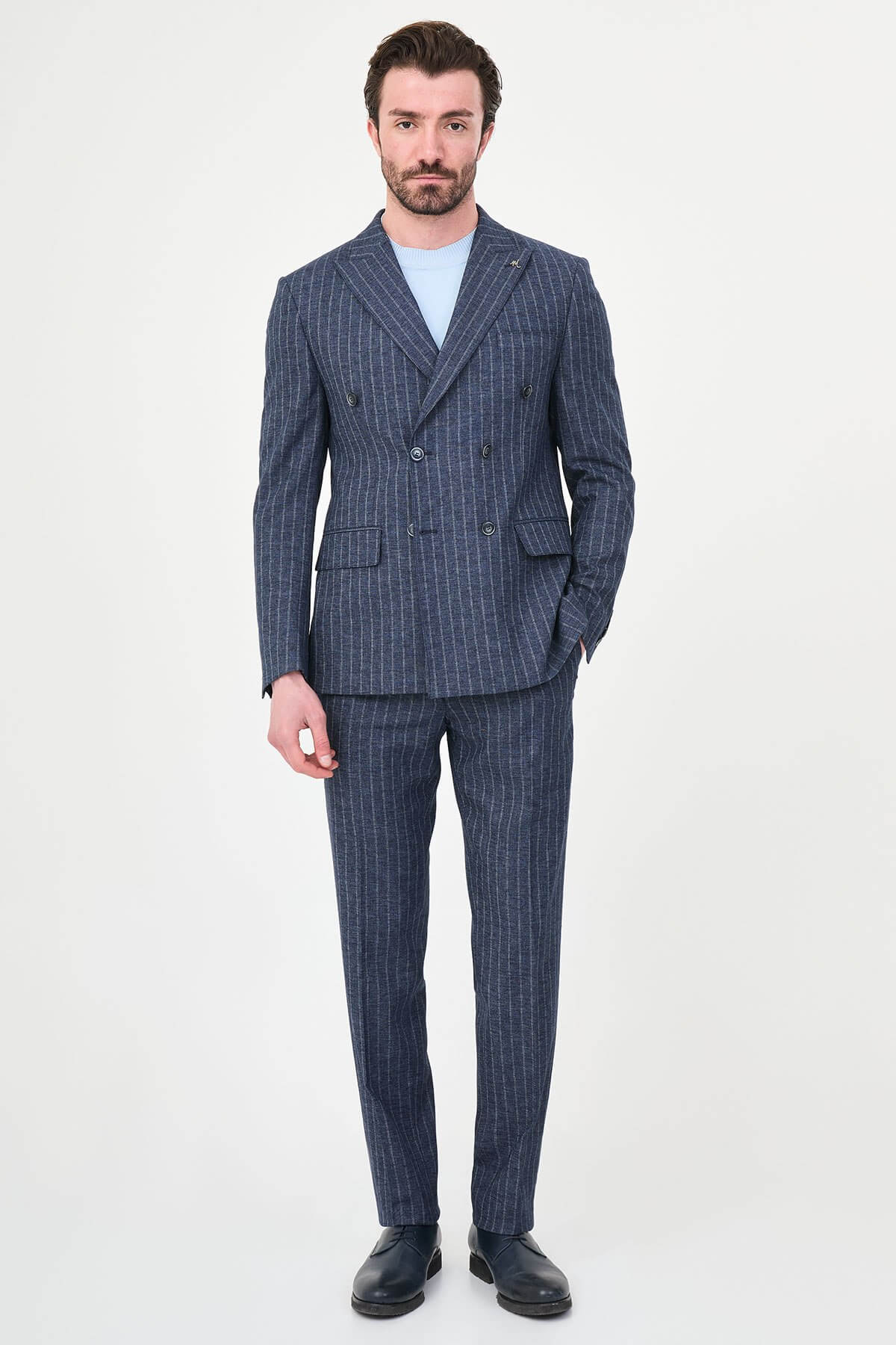 Model wearing Navy Blue Pinstripe Double-Breasted Suit