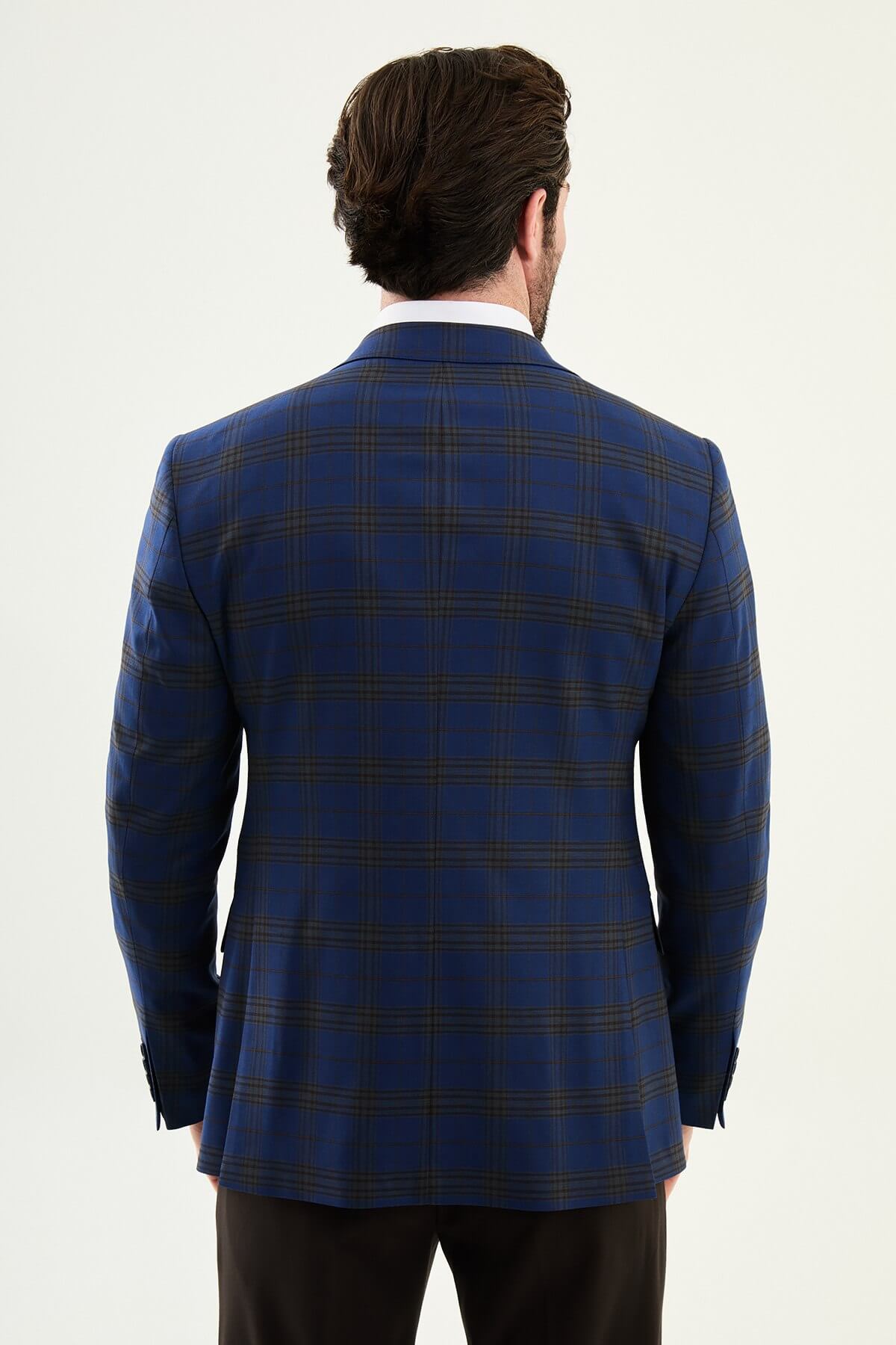Men wearing navy blue plaid slim fit suit with two-button jacket and flat-front trousers, styled for business and formal events