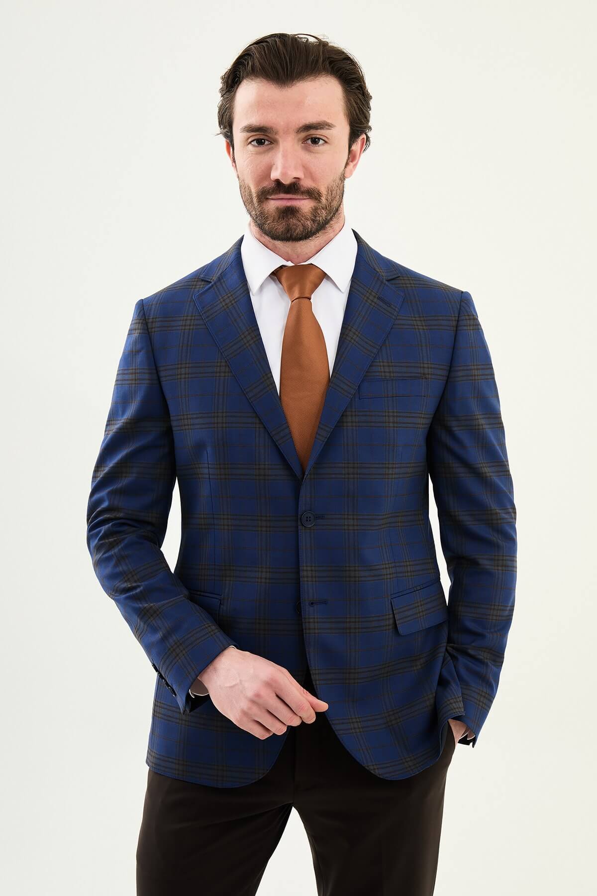 Men wearing navy blue plaid slim fit suit with two-button jacket and flat-front trousers, styled for business and formal events