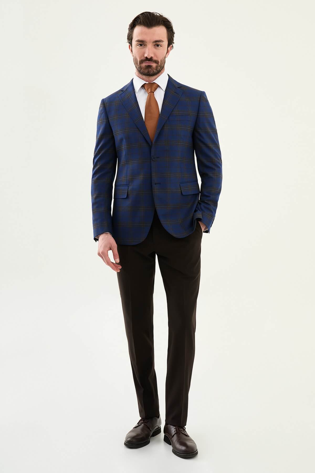 Men wearing navy blue plaid slim fit suit with two-button jacket and flat-front trousers, styled for business and formal events