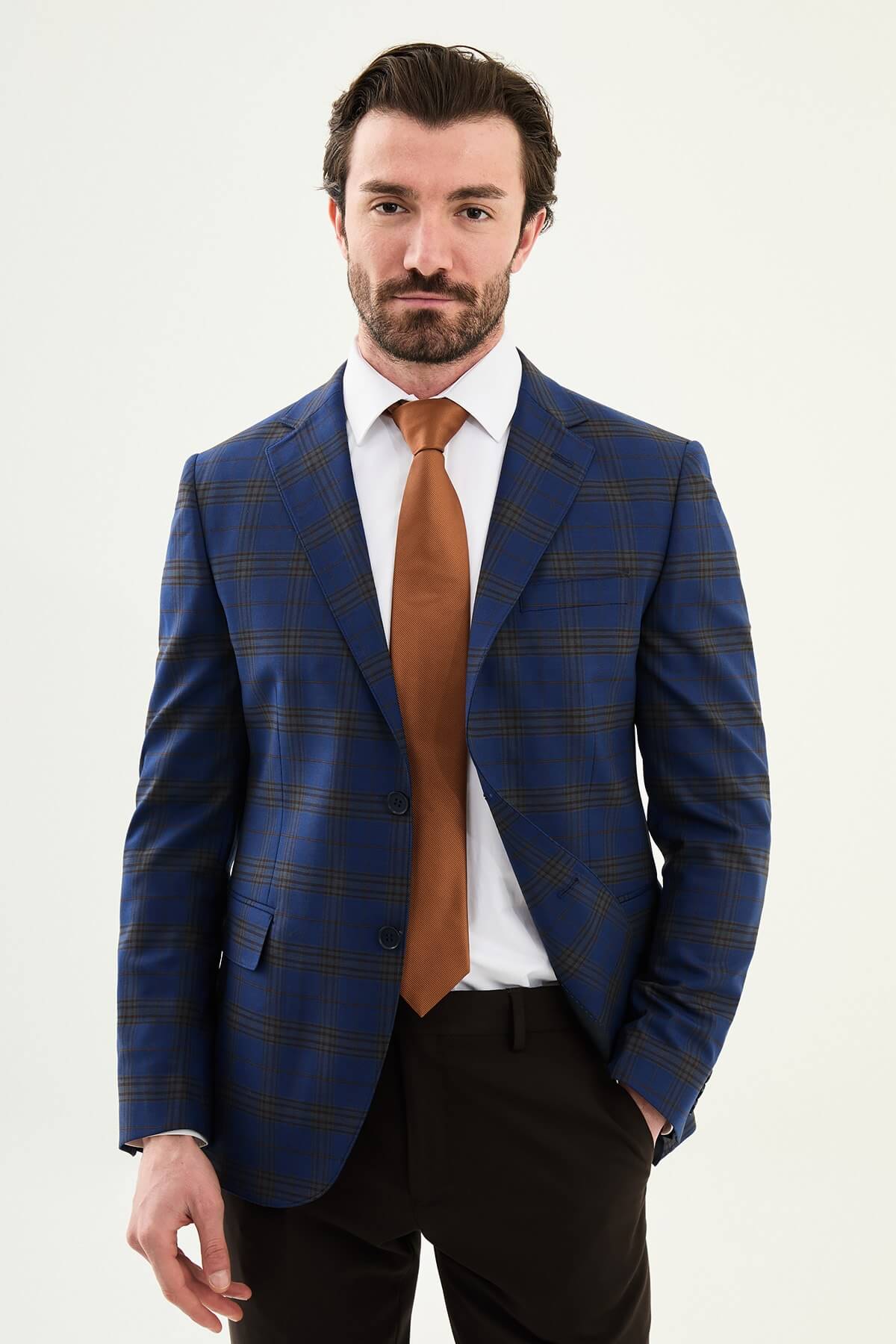 Men wearing navy blue plaid slim fit suit with two-button jacket and flat-front trousers, styled for business and formal events