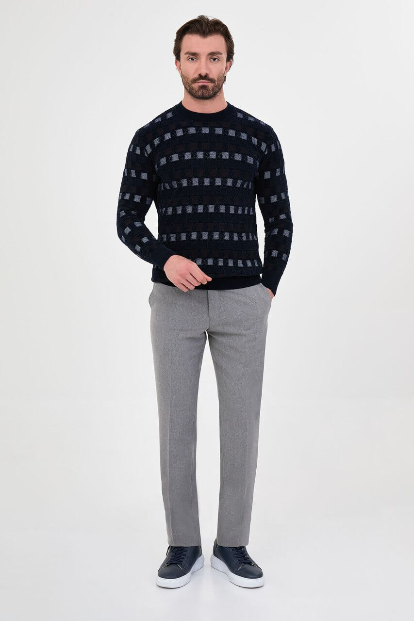 Men's navy blue textured crew neck knit sweater with patterned design for fall winter menswear.