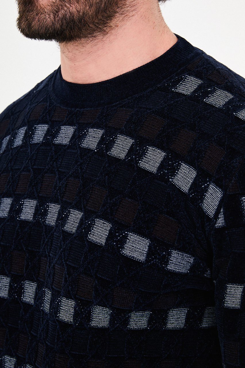 Men's navy blue textured crew neck knit sweater with patterned design for fall winter menswear.