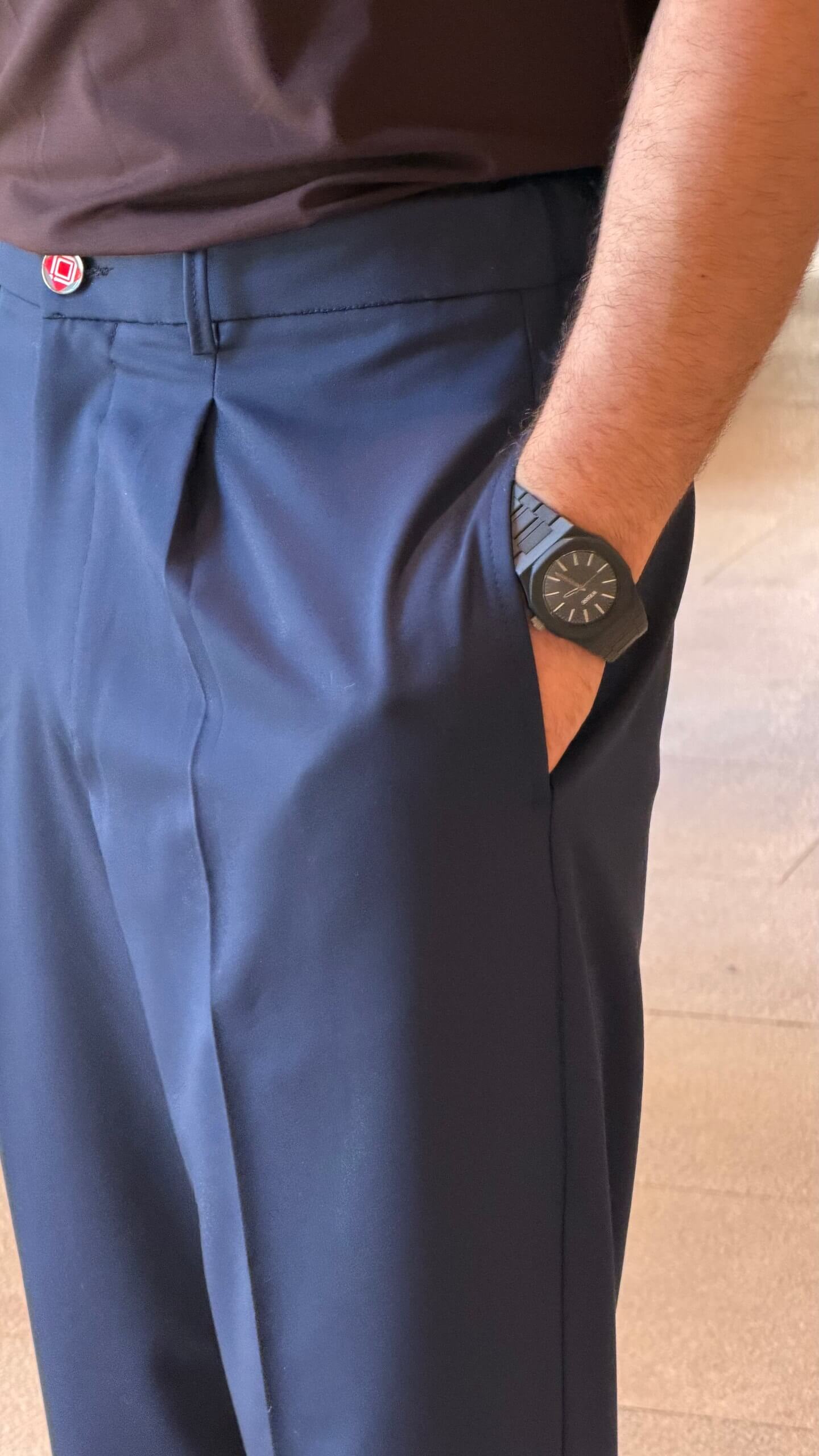 Men's navy blue single pleated trousers with tailored straight leg fit