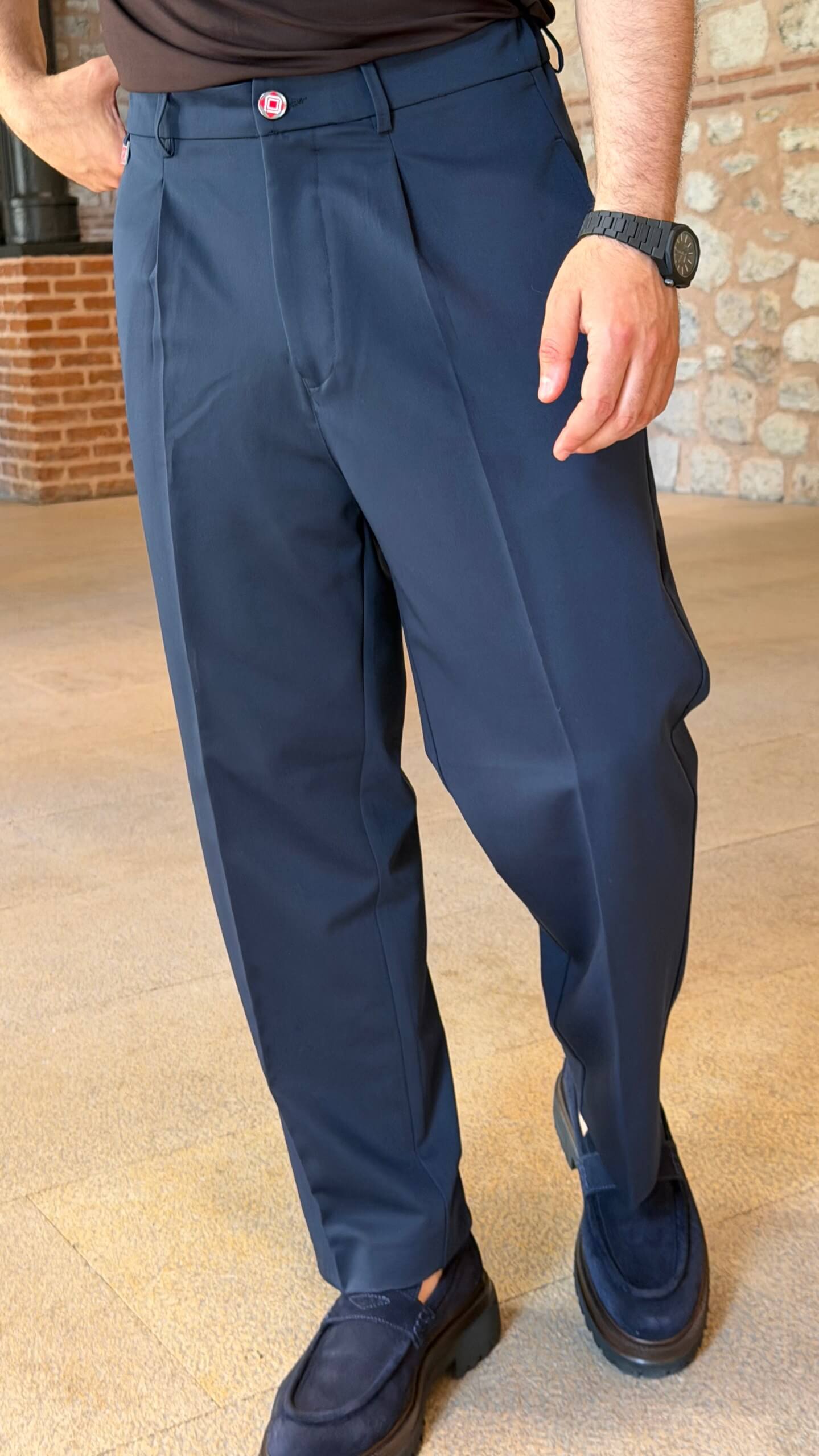 Men's navy blue single pleated trousers with tailored straight leg fit